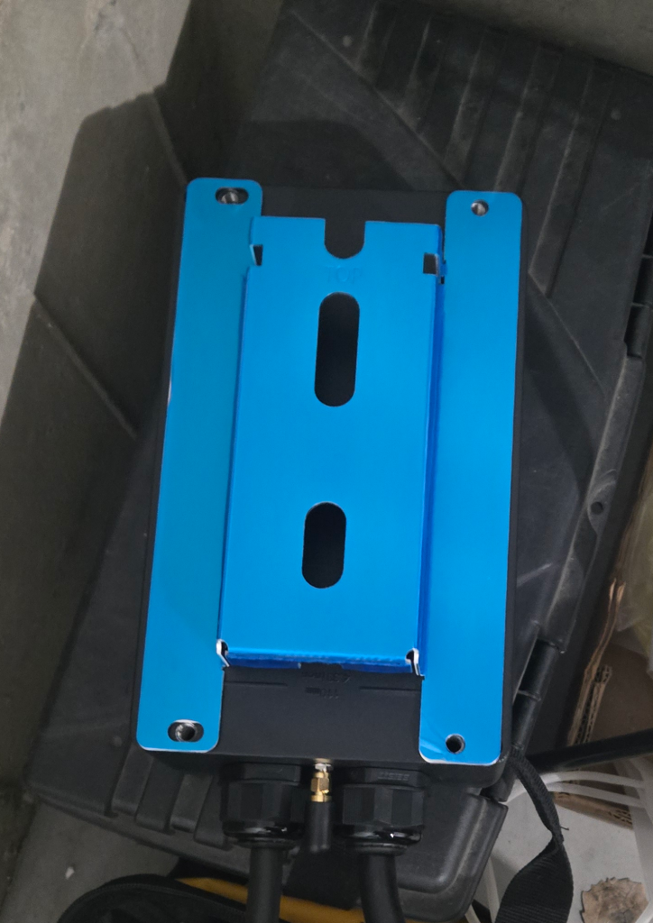 Mounting plate attached to charger